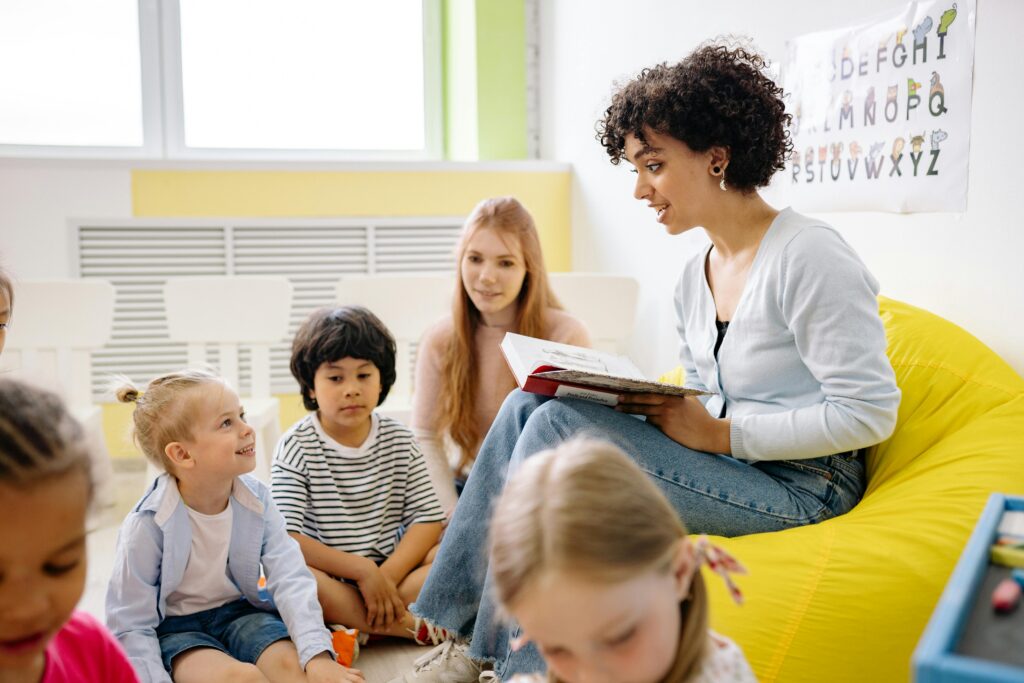Early years nursery practitioner teaching kids in London